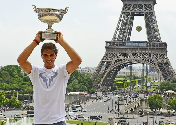 PARIS, FRANCE - JUNE 09: Rafael Nadal of Spain poses with the Coupe des Mousquetaires trophy in front of the Eiffel Tower after his victory against Novak Djokovic of Serbia during day 16 of the French Open at Roland Garros on June 9, 2014 in Paris, France. (Photo by Frederic T Stevens/Getty Images)