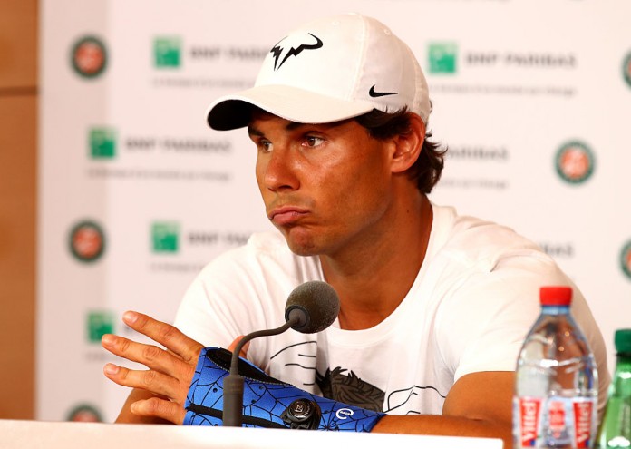 PARIS, FRANCE - MAY 27: Rafael Nadal of Spain announces during a press conference that he is withdrawing from the tournament due to a wrist injury on day six of the 2016 French Open at Roland Garros on May 27, 2016 in Paris, France. (Photo by Clive Brunskill/Getty Images)