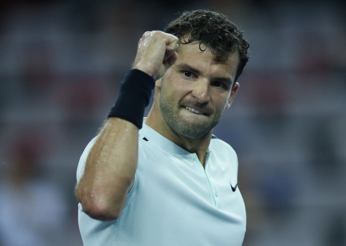 SHANGHAI, CHINA - OCTOBER 11: Grigor Dimitrov of Bulgaria celebrates after winning the Men's singles mach against Ryan Harrisoncx of the United States on day four of 2017 ATP Shanghai Rolex Masters at Qizhong Stadium on October 11, 2017 in Shanghai, China. (Photo by Lintao Zhang/Getty Images)