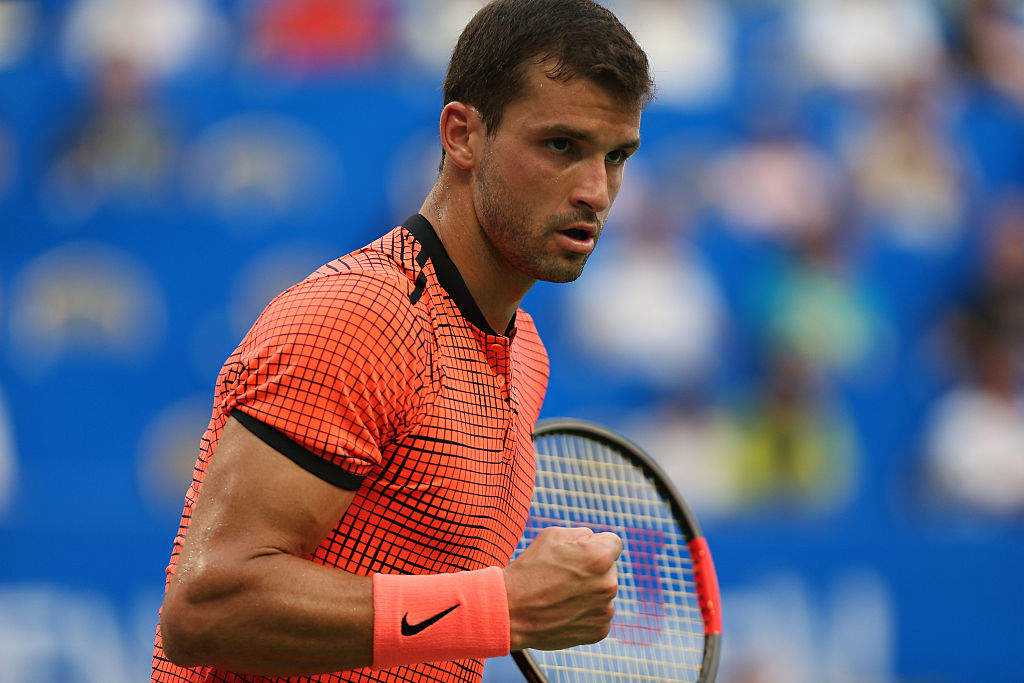 CHENGDU, CHINA - OCTOBER 01: Grigor Dimitrov of Bulgaria celebrates during the semi final match against Albert Ramos-Vinolas of Spain during Day 6 of 2016 ATP Chengdu Open at Sichuan International Tennis Centre on October 1, 2016 in Chengdu, China. (Photo by Zhong Zhi/Getty Images)