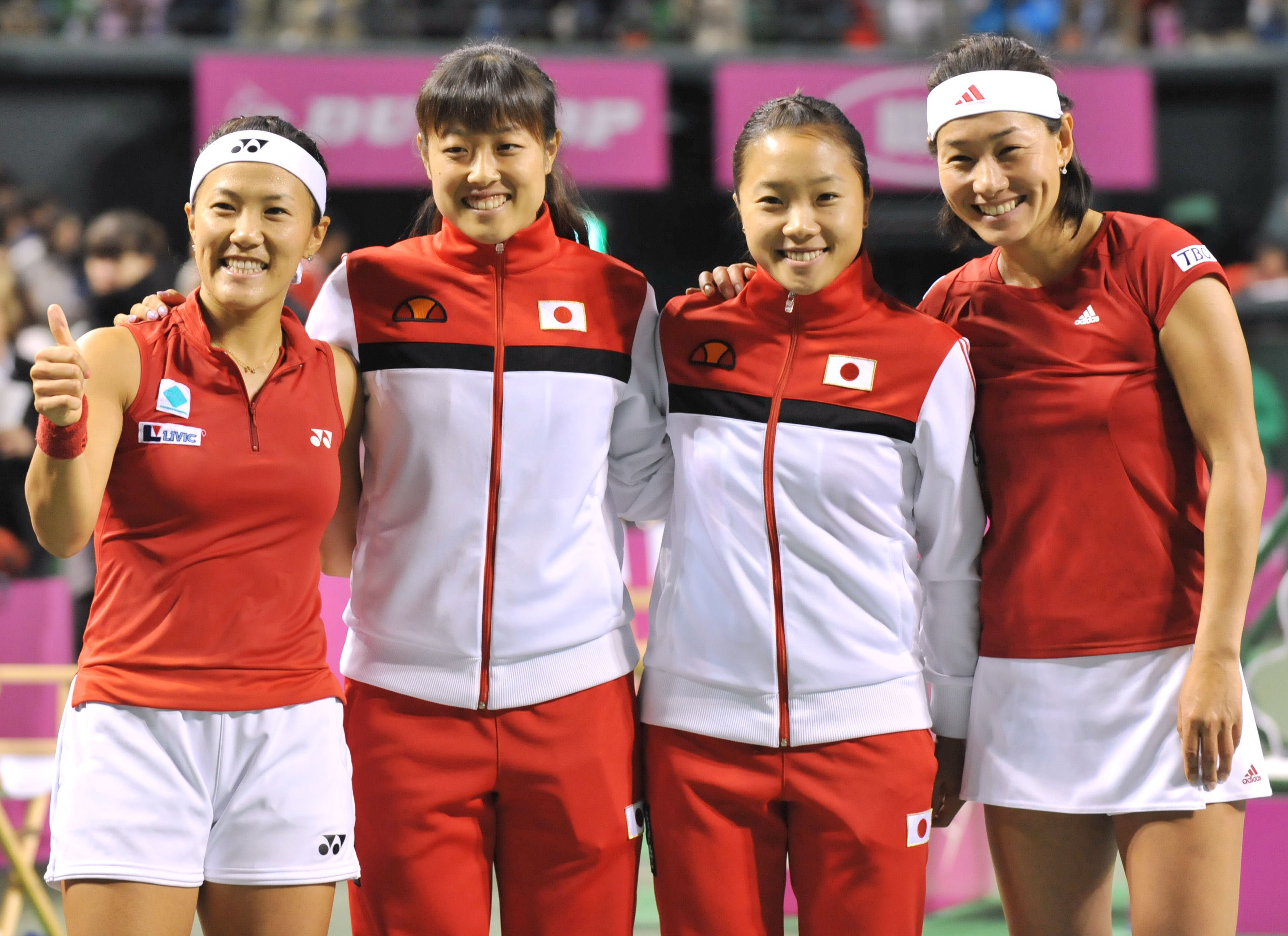 Japan's Fed Cup tennis team players (L-R) Rika Fujiwara, Ayumi Morita, Kurumi Nara, and Kimiko Date-Krumm celebrate after beating Belgium in the Fed Cup tennis World Group play-off tie in Tokyo on April 22, 2012. AFP PHOTO / KAZUHIRO NOGI