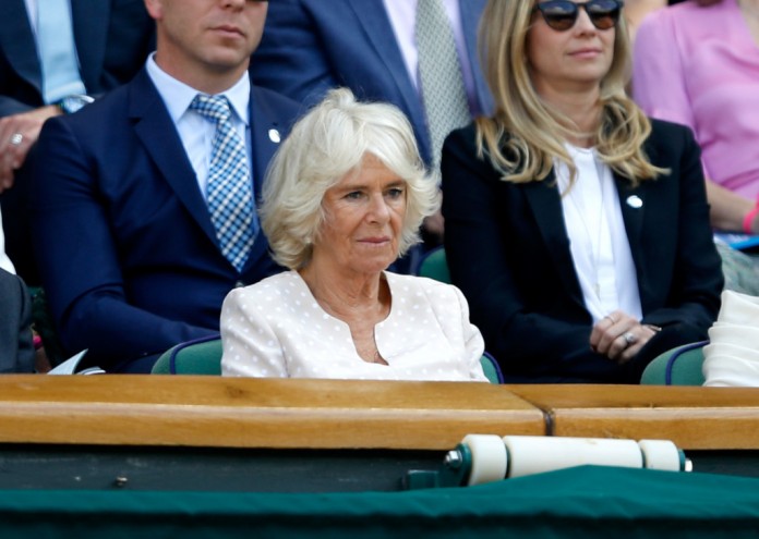 LONDON, ENGLAND - JULY 11: Camilla, Duchess of Cornwall (C) attends day nine of the Wimbledon Lawn Tennis Championships at All England Lawn Tennis and Croquet Club on July 11, 2018 in London, England. (Photo by Julian Finney/Getty Images)