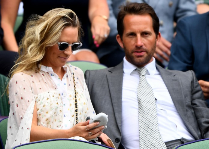 LONDON, ENGLAND - JULY 09: Sir Ben Ainslie (R) and his wife Georgie Thompson attends day seven of the Wimbledon Lawn Tennis Championships at All England Lawn Tennis and Croquet Club on July 9, 2018 in London, England. (Photo by Clive Mason/Getty Images)
