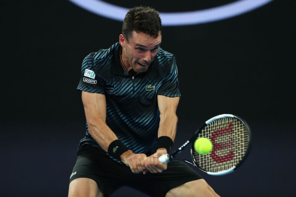 MELBOURNE, AUSTRALIA - JANUARY 14: Roberto Bautista Agut of Spain plays a backhand in his first round match against Andy Murray of Great Britain during day one of the 2019 Australian Open at Melbourne Park on January 14, 2019 in Melbourne, Australia. (Photo by Cameron Spencer/Getty Images)