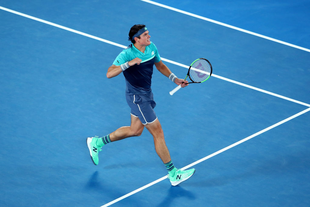 MELBOURNE, AUSTRALIA - JANUARY 17: Milos Raonic of Canada celebrates a point in his second round match against Stan Wawrinka of Switzerland during day four of the 2019 Australian Open at Melbourne Park on January 17, 2019 in Melbourne, Australia. (Photo by Cameron Spencer/Getty Images)
