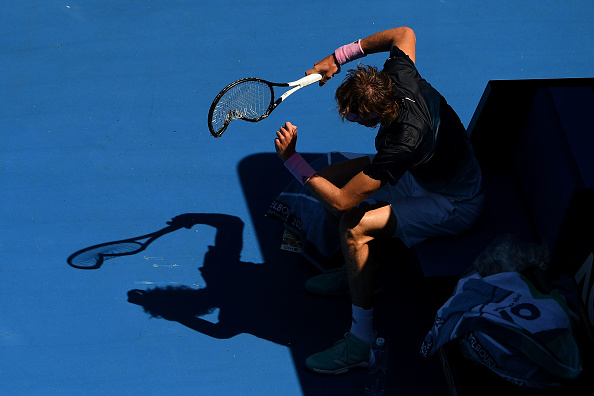 MELBOURNE, AUSTRALIA - JANUARY 21: Alexander Zverev of Germany smashes his racquet in between games in his fourth round match against Milos Raonic of Canada during day eight of the 2019 Australian Open at Melbourne Park on January 21, 2019 in Melbourne, Australia. (Photo by Quinn Rooney/Getty Images)
