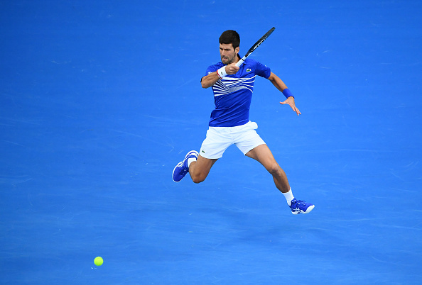 MELBOURNE, AUSTRALIA - JANUARY 27: Novak Djokovic of Serbia plays a forehand in his Men's Singles Final match against Rafael Nadal of Spain during day 14 of the 2019 Australian Open at Melbourne Park on January 27, 2019 in Melbourne, Australia. (Photo by Quinn Rooney/Getty Images)