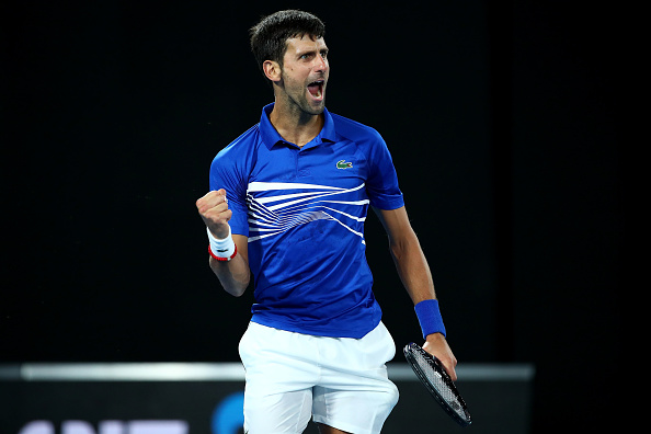 MELBOURNE, AUSTRALIA - JANUARY 27: Novak Djokovic of Serbia celebrates a point in his Men's Singles Final match against Rafael Nadal of Spain during day 14 of the 2019 Australian Open at Melbourne Park on January 27, 2019 in Melbourne, Australia. (Photo by Cameron Spencer/Getty Images)
