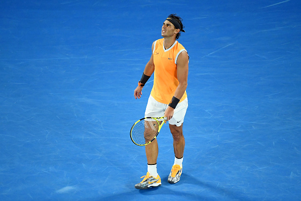 MELBOURNE, AUSTRALIA - JANUARY 27: Rafael Nadal of Spain reacts in his Men's Singles Final match against Novak Djokovic of Serbia during day 14 of the 2019 Australian Open at Melbourne Park on January 27, 2019 in Melbourne, Australia. (Photo by Quinn Rooney/Getty Images)