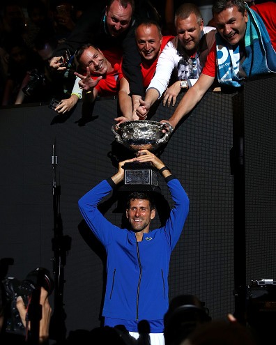 MELBOURNE, AUSTRALIA - JANUARY 27: Novak Djokovic of Serbia poses with the Norman Brookes Challenge Cup following victory in his Men's Singles Final match against Rafael Nadal of Spain during day 14 of the 2019 Australian Open at Melbourne Park on January 27, 2019 in Melbourne, Australia. (Photo by Julian Finney/Getty Images)