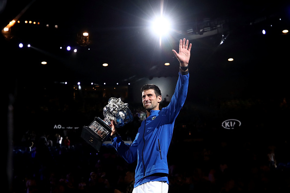 MELBOURNE, AUSTRALIA - JANUARY 27: Novak Djokovic of Serbia poses with the Norman Brookes Challenge Cup following victory in his Men's Singles Final match against Rafael Nadal of Spain during day 14 of the 2019 Australian Open at Melbourne Park on January 27, 2019 in Melbourne, Australia. (Photo by Cameron Spencer/Getty Images)