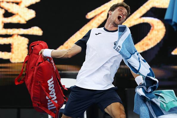 MELBOURNE, AUSTRALIA - JANUARY 21: Pablo Carreno Busta of Spain throws his bag as he shows his frustration after defeat in his fourth round match against Kei Nishikori of Japan during day eight of the 2019 Australian Open at Melbourne Park on January 21, 2019 in Melbourne, Australia. (Photo by Mark Kolbe/Getty Images)