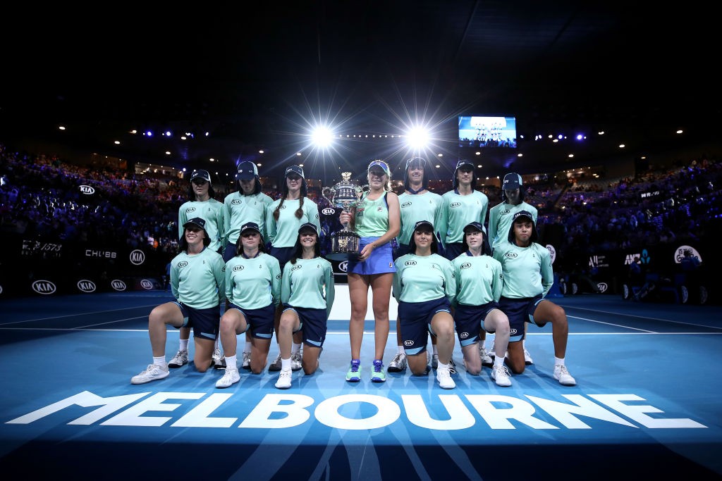 MELBOURNE, AUSTRALIA - FEBRUARY 01: Sofia Kenin of the United States poses with the Daphne Akhurst Memorial Cup and ballkids after winning her Women's Singles Final match against Garbine Muguruza of Spain on day thirteen of the 2020 Australian Open at Melbourne Park on February 01, 2020 in Melbourne, Australia. (Photo by Cameron Spencer/Getty Images)