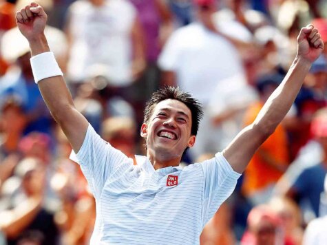 NEW YORK, NY - SEPTEMBER 06: Kei Nishikori of Japan celebrates after defeating Novak Djokovic of Serbia in their men's singles semifinal match on Day Thirteen of the 2014 US Open at the USTA Billie Jean King National Tennis Center on September 6, 2014 in the Flushing neighborhood of the Queens borough of New York City. Nishikori defeated Djokovic in four sets 6-4, 1-6, 7-6, 6-3. (Photo by Julian Finney/Getty Images)