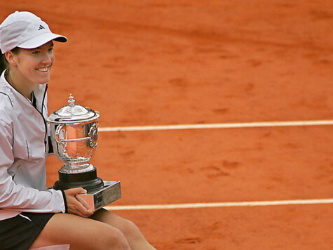 Belgium Justine Henin-Hardenne poses wit