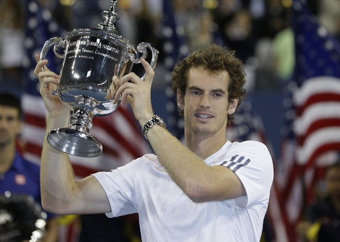 Britain's Andy Murray poses with the trophy after beating Serbia's Novak Djokovic in the championship match at the 2012 US Open tennis tournament, Monday, Sept. 10, 2012, in New York. (AP Photo/Mike Groll)