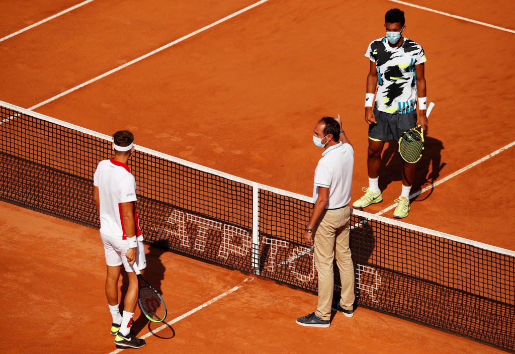 ROME, ITALY - SEPTEMBER 14: Felix Auger-Aliassime of Canada and Filip Krajinovic of Serbia take part in the coins toss ahead of their round one match during day one of the Internazionali BNL D'Italia at Foro Italico on September 14, 2020 in Rome, Italy. (Photo by Clive Brunskill/Getty Images)
