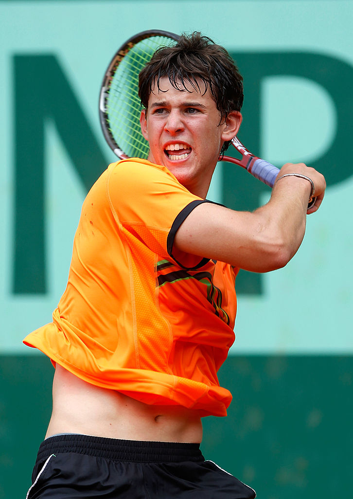 PARIS, FRANCE - JUNE 05: Dominic Thiem of Austria hits a forehand during the boy's singles final match between Dominic Thiem of Austria and Bjorn Fratangelo of USA on day fifteen of the French Open at Roland Garros on June 5, 2011 in Paris, France. (Photo by Matthew Stockman/Getty Images)