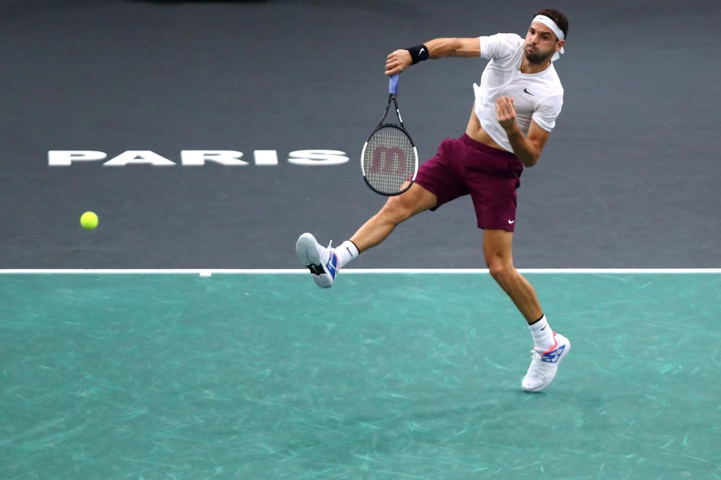 PARIS, FRANCE - NOVEMBER 02: Grigor Dimitrov of Bulgaria returns a overhead smash in his semi final match against Novak Djokovic of Serbia on day 6 of the Rolex Paris Masters, part of the ATP World Tour Masters 1000 held at the at AccorHotels Arena on November 2, 2019 in Paris, France. (Photo by Dean Mouhtaropoulos/Getty Images)
