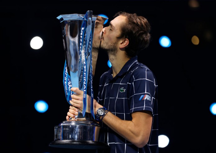 LONDON, ENGLAND - NOVEMBER 22: Daniil Medvedev of Russia lifts the trophy after winning his singles final match against Dominic Thiem of Austria during day eight of the Nitto ATP World Tour Finals at The O2 Arena on November 22, 2020 in London, England. (Photo by Clive Brunskill/Getty Images)
