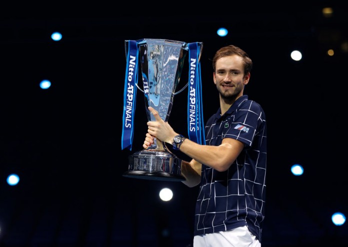LONDON, ENGLAND - NOVEMBER 22: Daniil Medvedev of Russia lifts the trophy after winning his singles final match against Dominic Thiem of Austria during day eight of the Nitto ATP World Tour Finals at The O2 Arena on November 22, 2020 in London, England. (Photo by Clive Brunskill/Getty Images)
